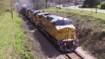UP 9717 leads a CSX train westbound